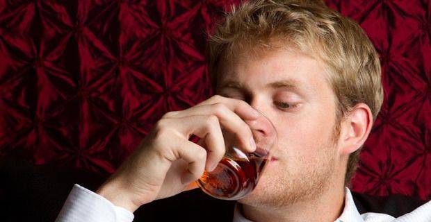 Young Man Tasting Malt Whisky